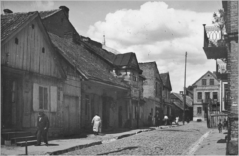 View of a street with wooden houses in prewar Bialystok